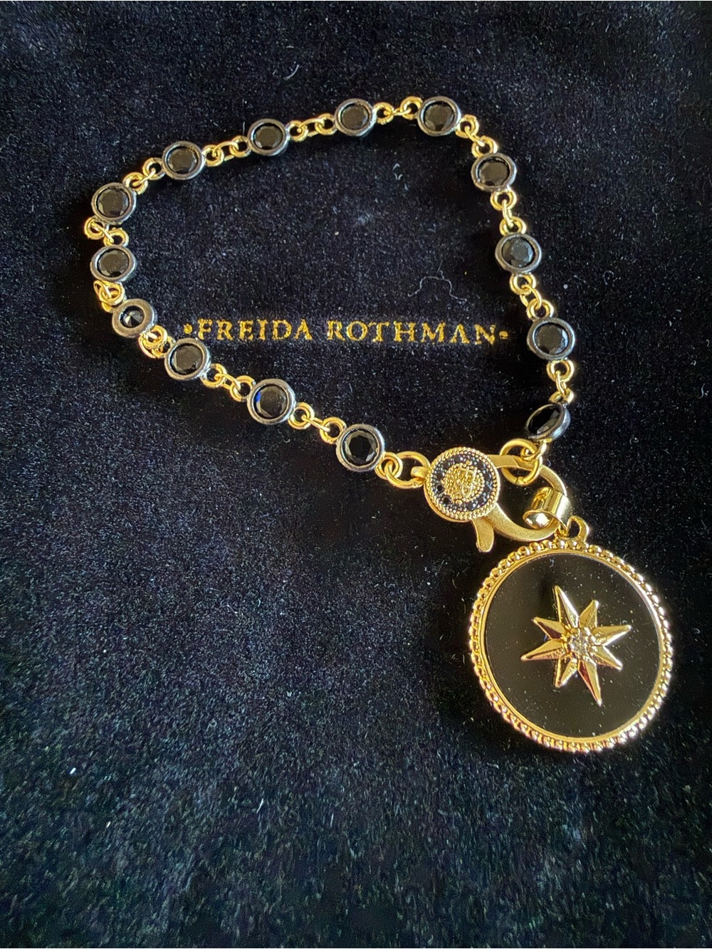 Freida Rothman Black and Gold Star Medallion Bracelet